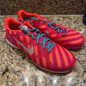 Nike Vibrant Red and Orange Sneakers with Teal Accents